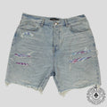 Amiri Tie Dye Thrasher Jean Shorts in Light Wash