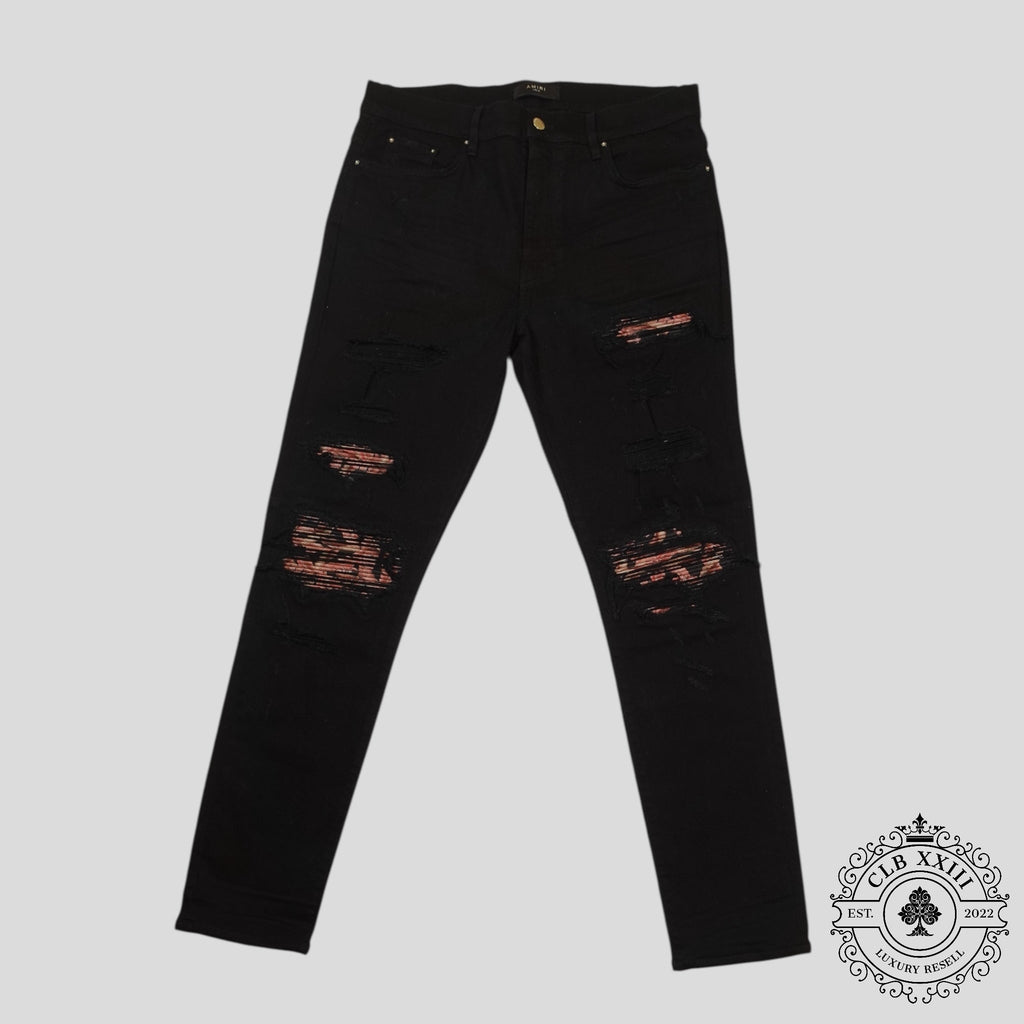 Amiri Banana Leaf Patch Thrasher Jeans in Black